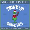 Funny Grinch character in Santa hat holding a wine glass with 'Drink Up Grinches' text SVG design.