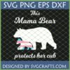 Transgender Mama Bear SVG design protecting her cub in transgender pride flag colors with text 'This Mama Bear protects her cub' by SVGCrafts.