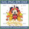 Cute Mickey Mouse in a turkey costume sitting with fall leaves and 'Happy Thanksgiving Day' text, perfect for SVG crafts.