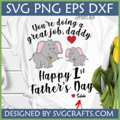 Happy 1st Father's Day Elephant SVG design on a white t-shirt with two cartoon elephants and text 'You're doing a great job, daddy'.
