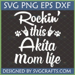 Rockin' Akita Mom Life SVG design with paw prints and rock on hand gestures for Cricut and Silhouette projects.