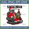 Funny Santalorian Grogu Christmas SVG featuring Santa Mandalorian holding Baby Yoda eating a frog, with a Christmas tree and presents.